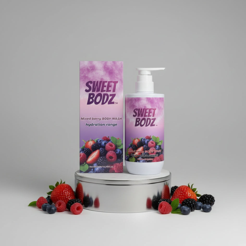 SWEETBODZ Mixed Berry Body Wash 500ml displayed with product packaging and fresh mixed berries on a studio pedestal